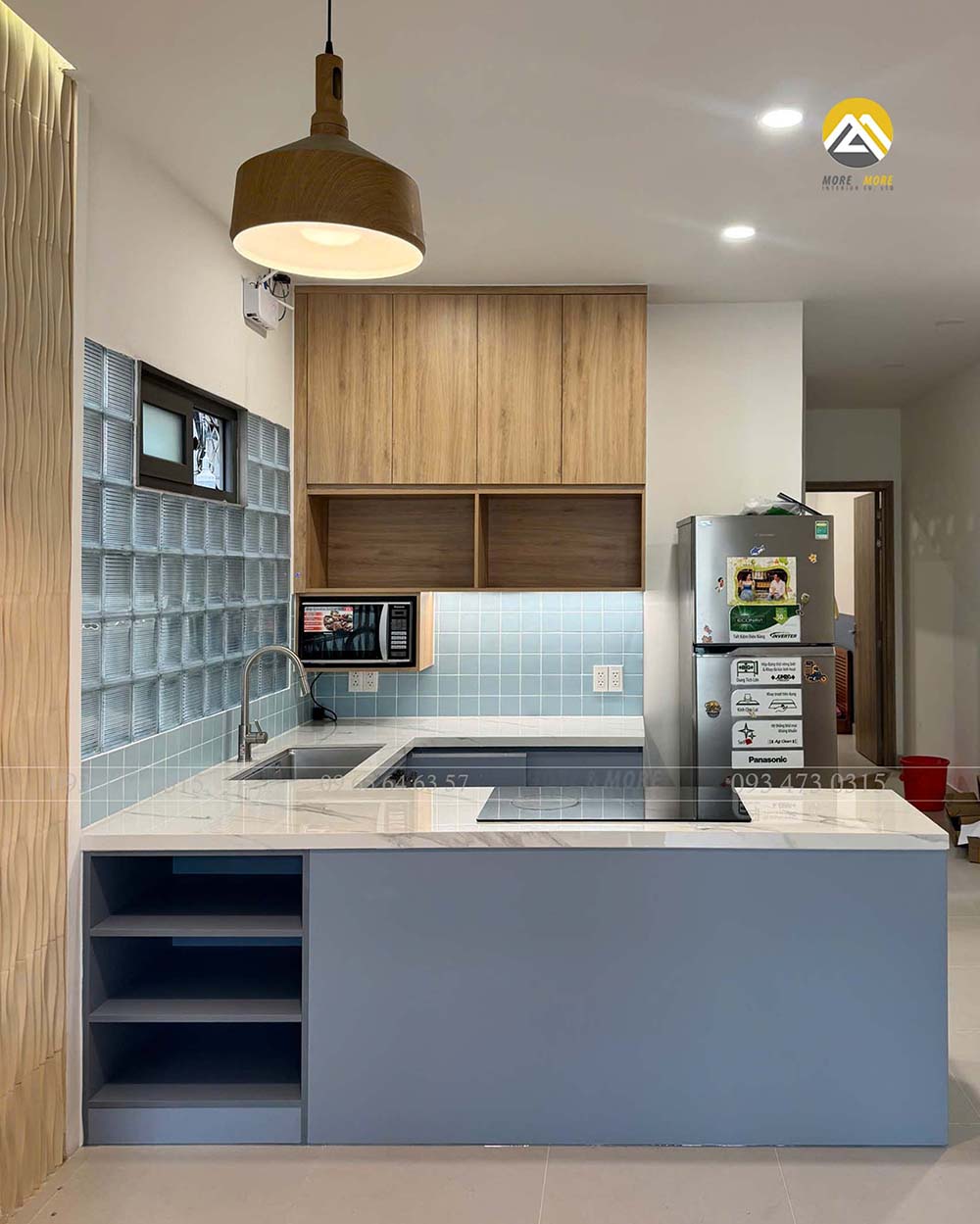 Tủ bếp dưới sử dụng Lacquered laminate An Cường, tủ trên sử dụng Melamine vân gỗ An Cường